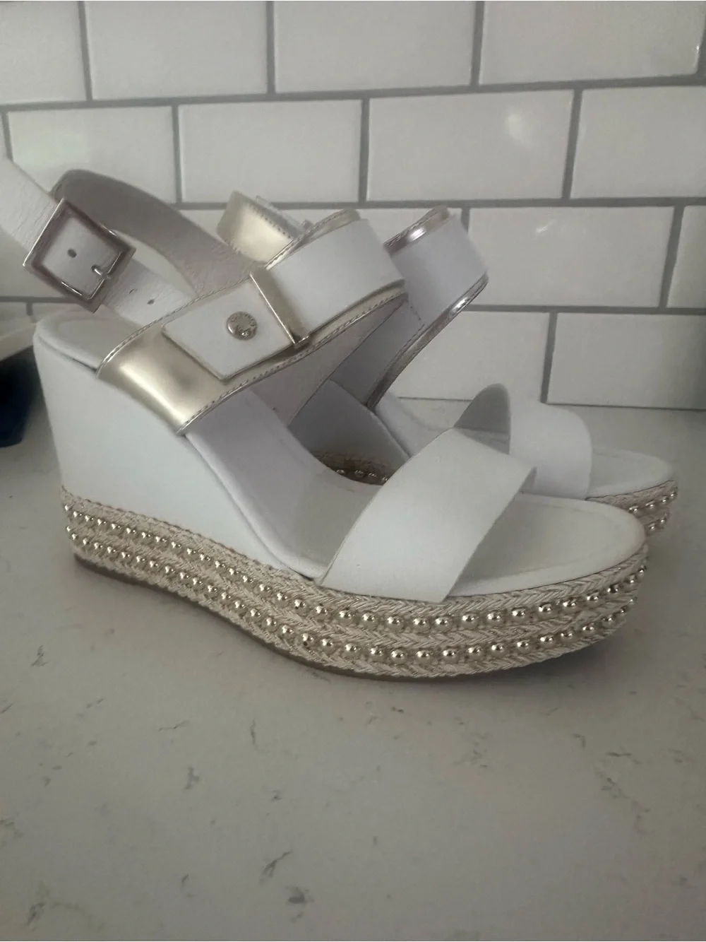 Nero Giardini wedge sandals feature a studded espadrille platform Size 37